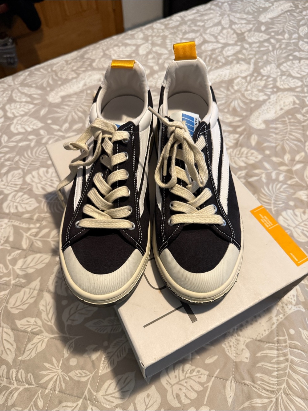 Women's Low-Top Canvas Sneakers in Black & White with Yellow Pull Tab